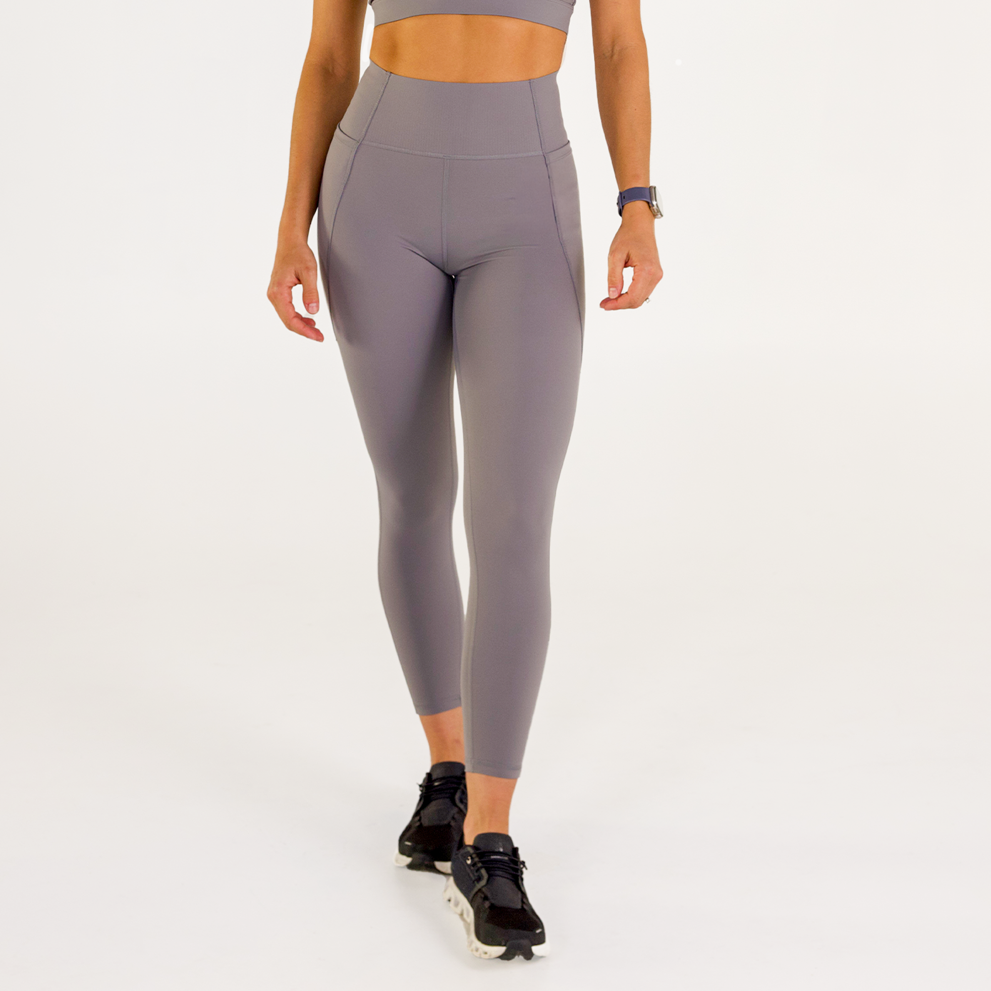 Woman wearing abalone shell Trimline 7/8 Leggings by Definite Articles.