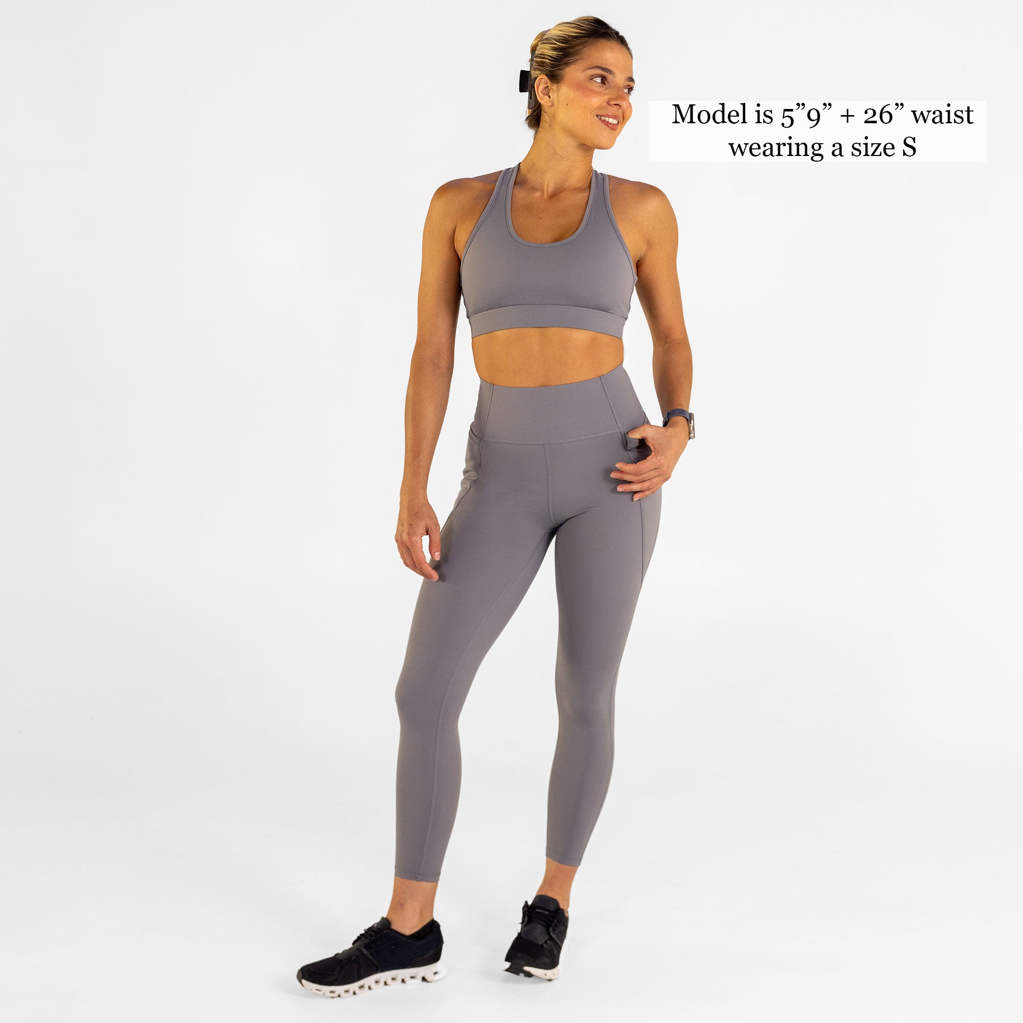 Woman wearing abalone shell Trimline 7/8 Leggings by Definite Articles. Model is 5"9" + 26" waist wearing a size small.