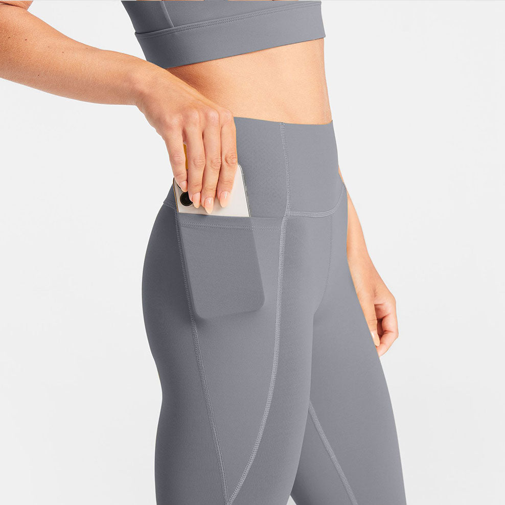 Woman wearing abalone shell Trimline 7/8 Leggings by Definite Articles.