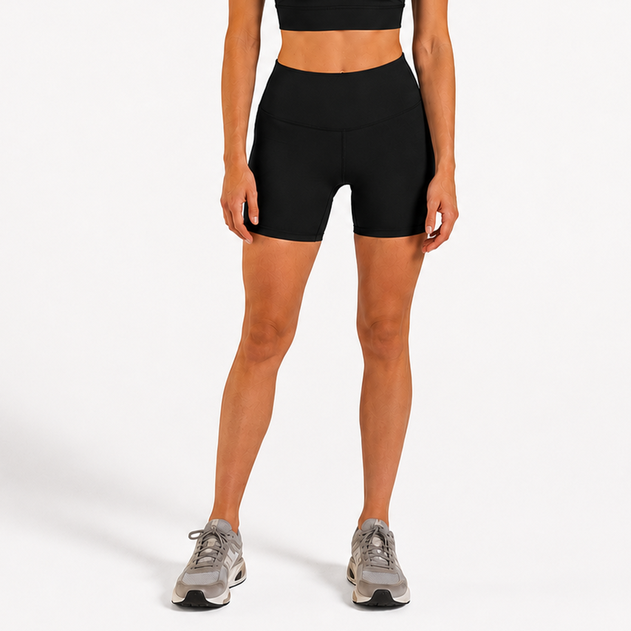 Woman wearing black Trimline 5" Shorts by Definite Articles.