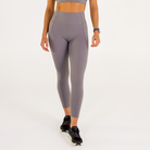 Woman wearing abalone shell Trimline 7/8 Leggings by Definite Articles. 