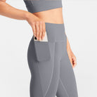 Woman wearing abalone shell Trimline 7/8 Leggings by Definite Articles.