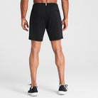 Man wearing black Tor Shorts by Definite Articles. 
