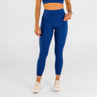 Woman wearing estate blue Trimline 7/8 Leggings by Definite Articles.