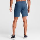 Man wearing ocean blue Tor Shorts  by Definite Articles. 