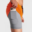 Man wearing orange Tor Shorts  by Definite Articles. Closeup on pocket.