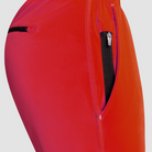 Closeup of a man wearing scarlet red Tor Shorts by Definite Articles. 