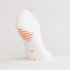 White women's gripper sock by Definite Articles, side profile